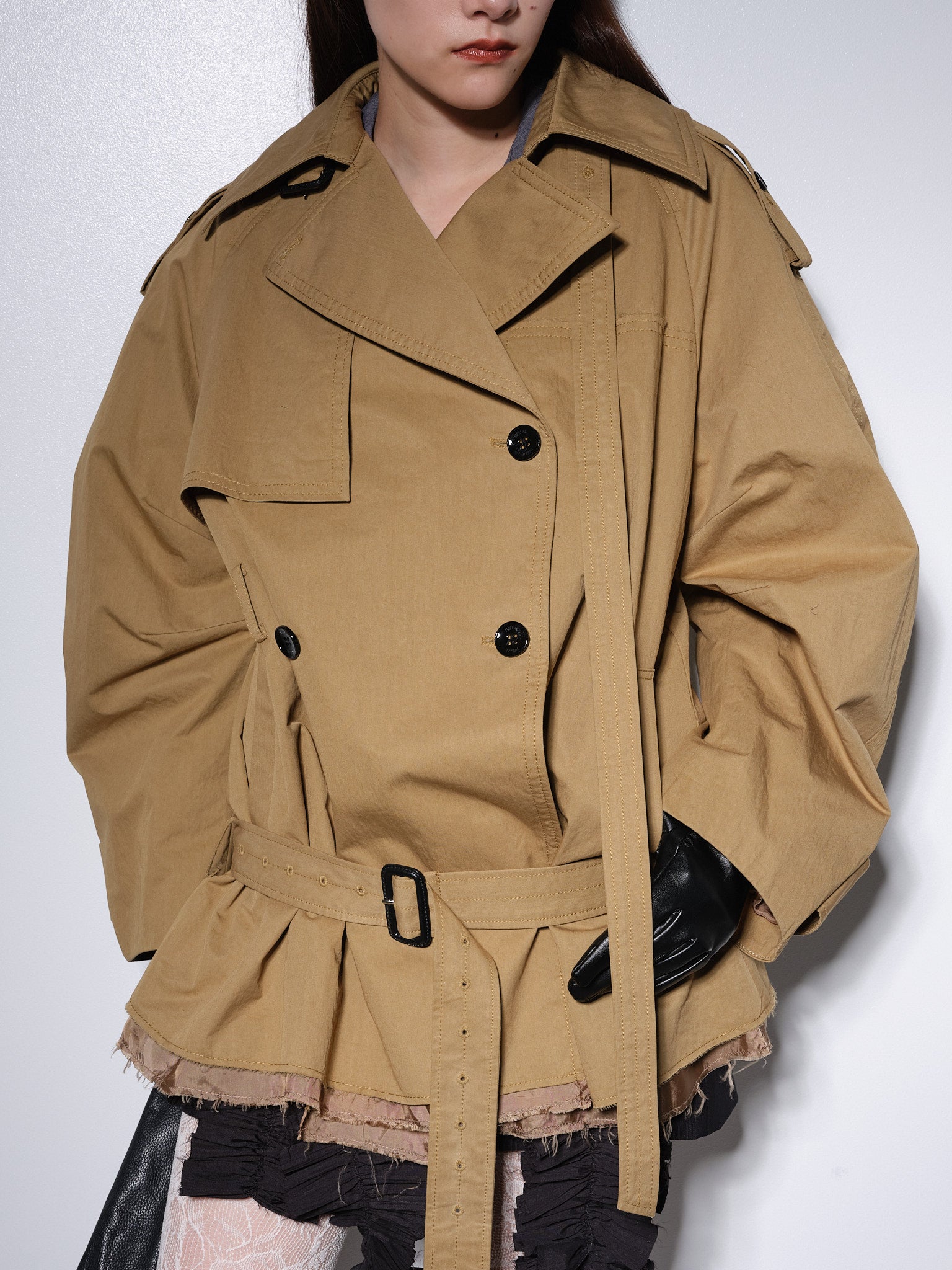 Oval trench coat